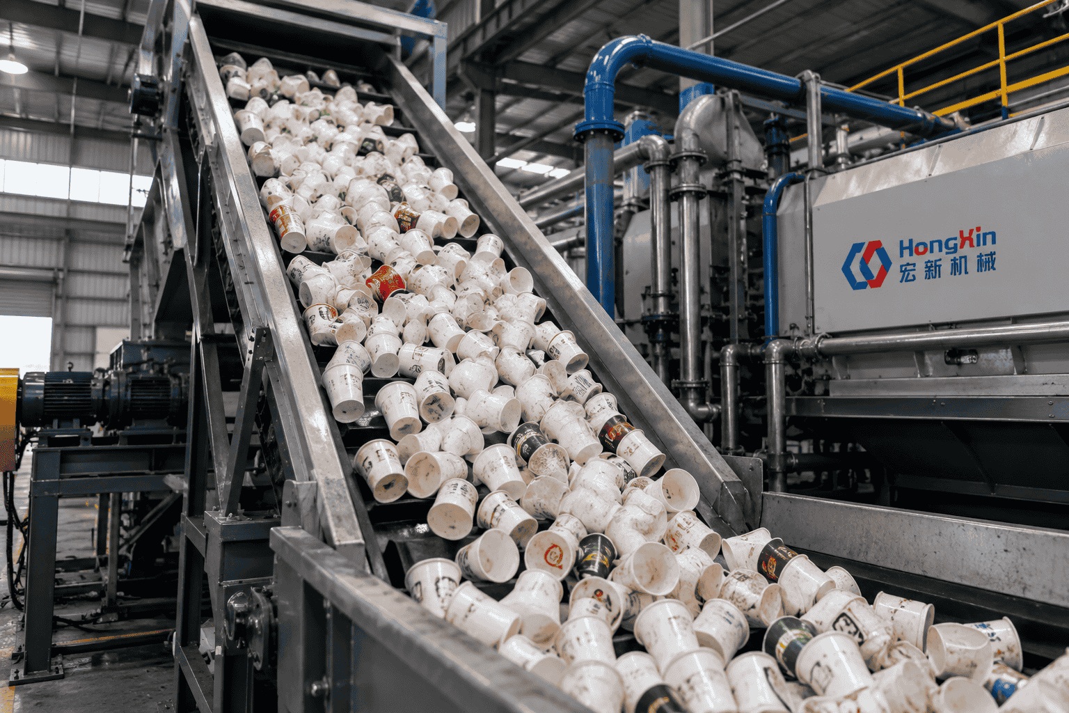 Paper cups entering recycling line